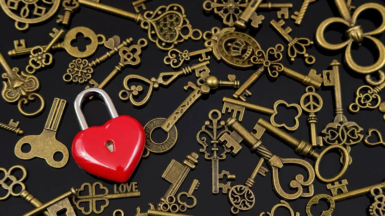Antique keys scattered on black — a credential left in plain sight among many.