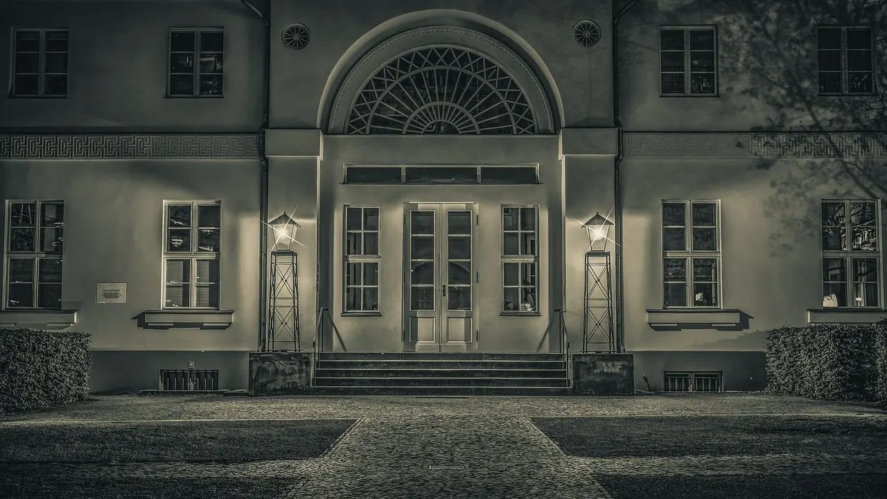 A grand house facade lit at night — an app that looks finished, its doors not yet checked.
