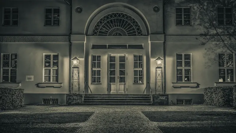 A grand house facade lit at night — an app that looks finished, its doors not yet checked.