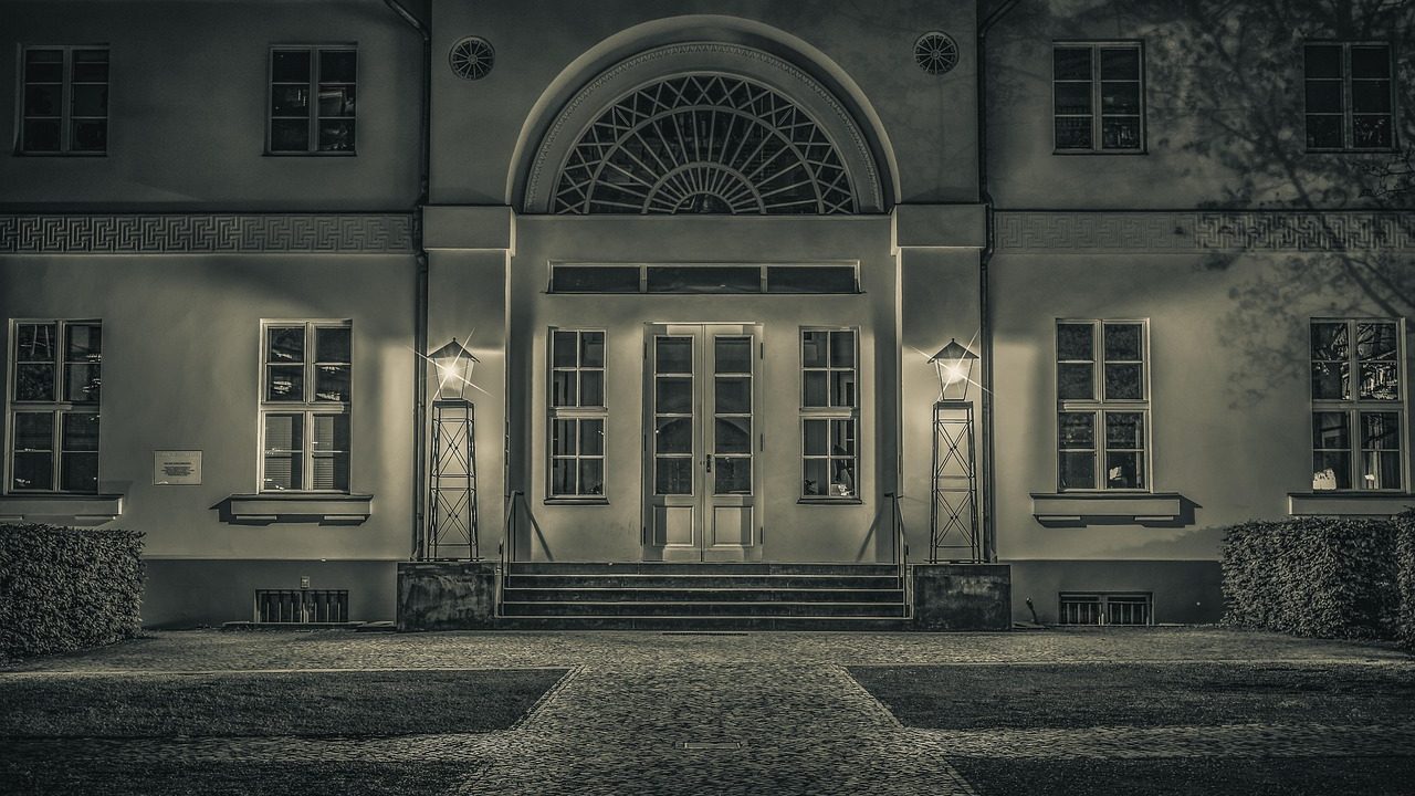 A grand house facade lit at night — an app that looks finished, its doors not yet checked.