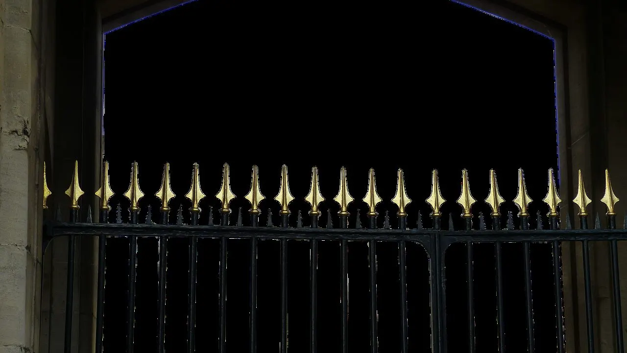 A dim locked gate at night — a paid customer still shut out because the subscription never switched on.