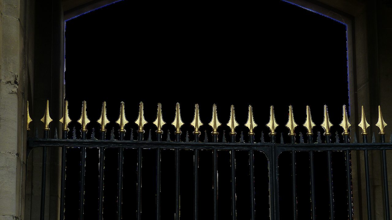 A dim locked gate at night — a paid customer still shut out because the subscription never switched on.