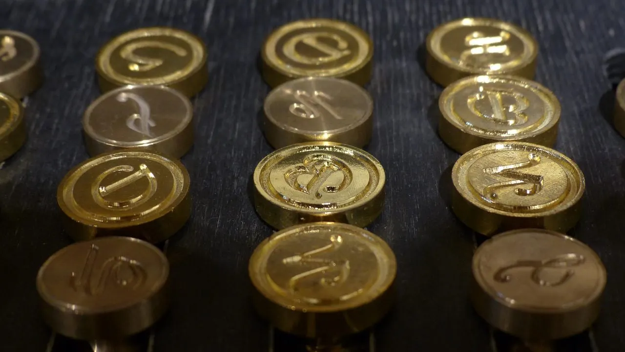 Brass seal stamps on dark wood — the signature a webhook checks before it trusts a message.