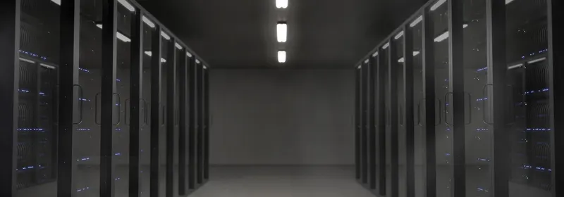 A dark, quiet server room — the kind of infrastructure a paused project leaves idle.